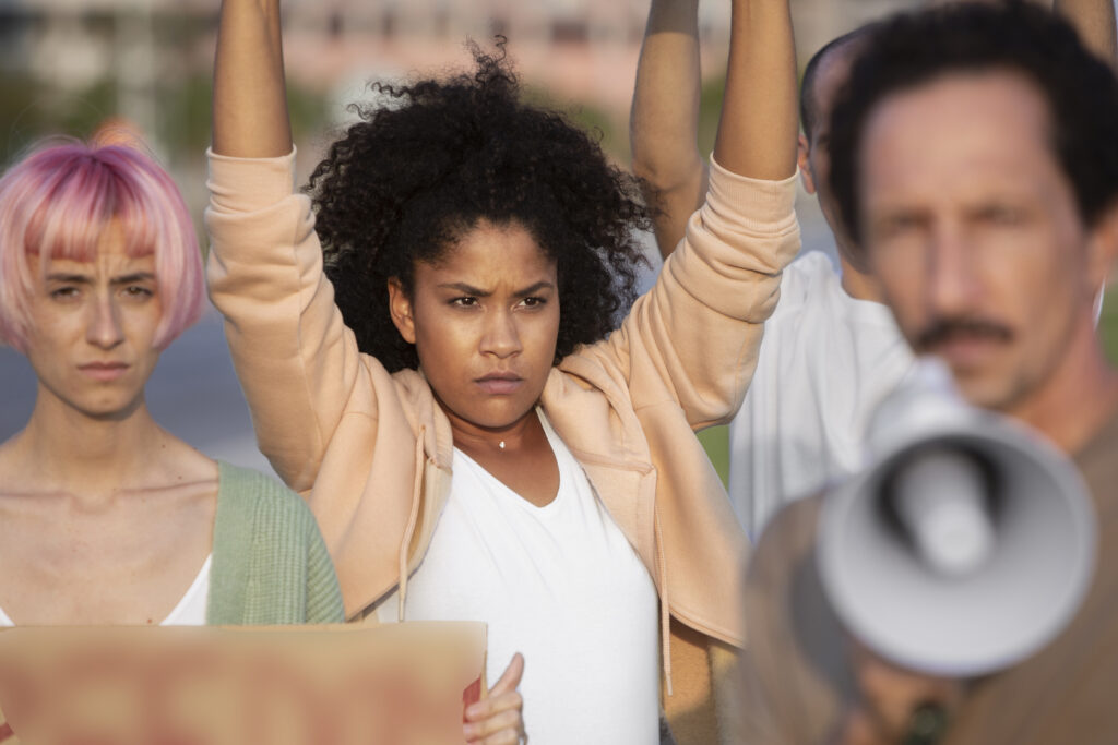 close-up-people-protesting-outdoors