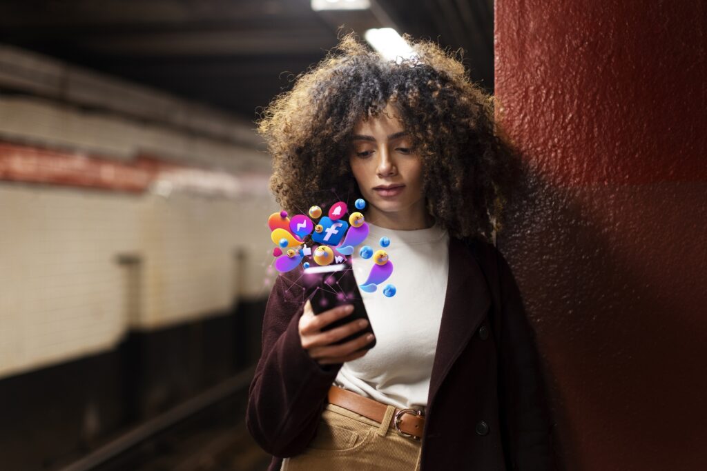 medium shot woman holding smartphone