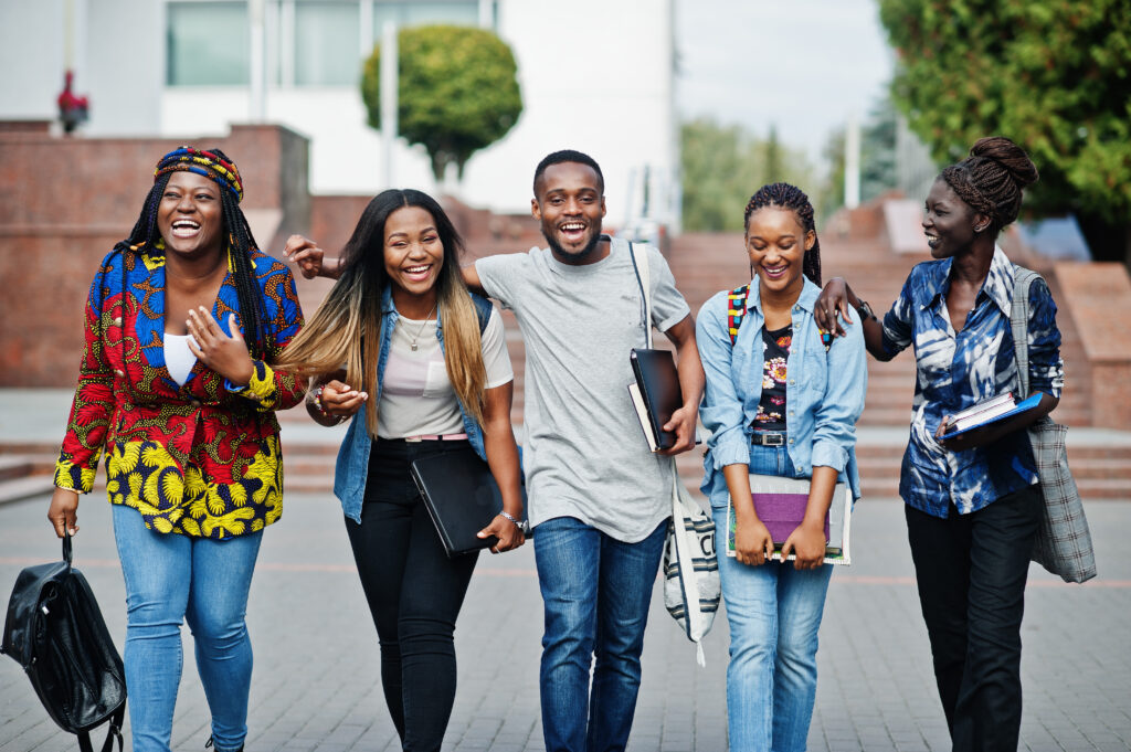 group five african college students spending time together campus university yard black afro friends studying education theme